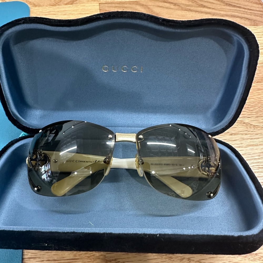 Gucci Black and Gold Sunglasses